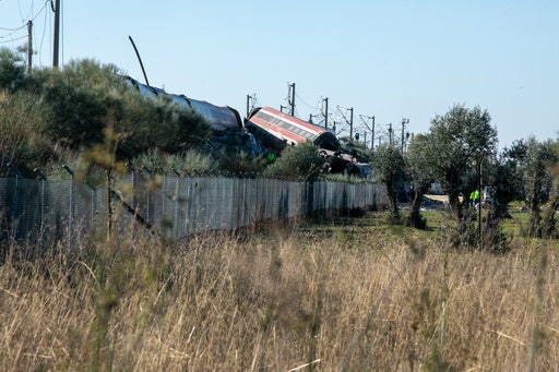 Aftermath of a high-speed train collision in central Spain, emergency services at work.